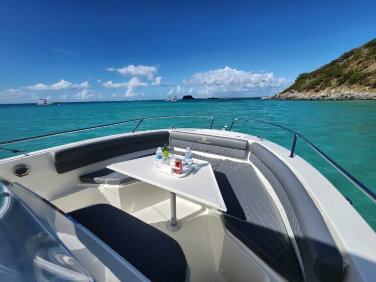 Interior of a 25-foot Pacific Craft boat with seating and a table